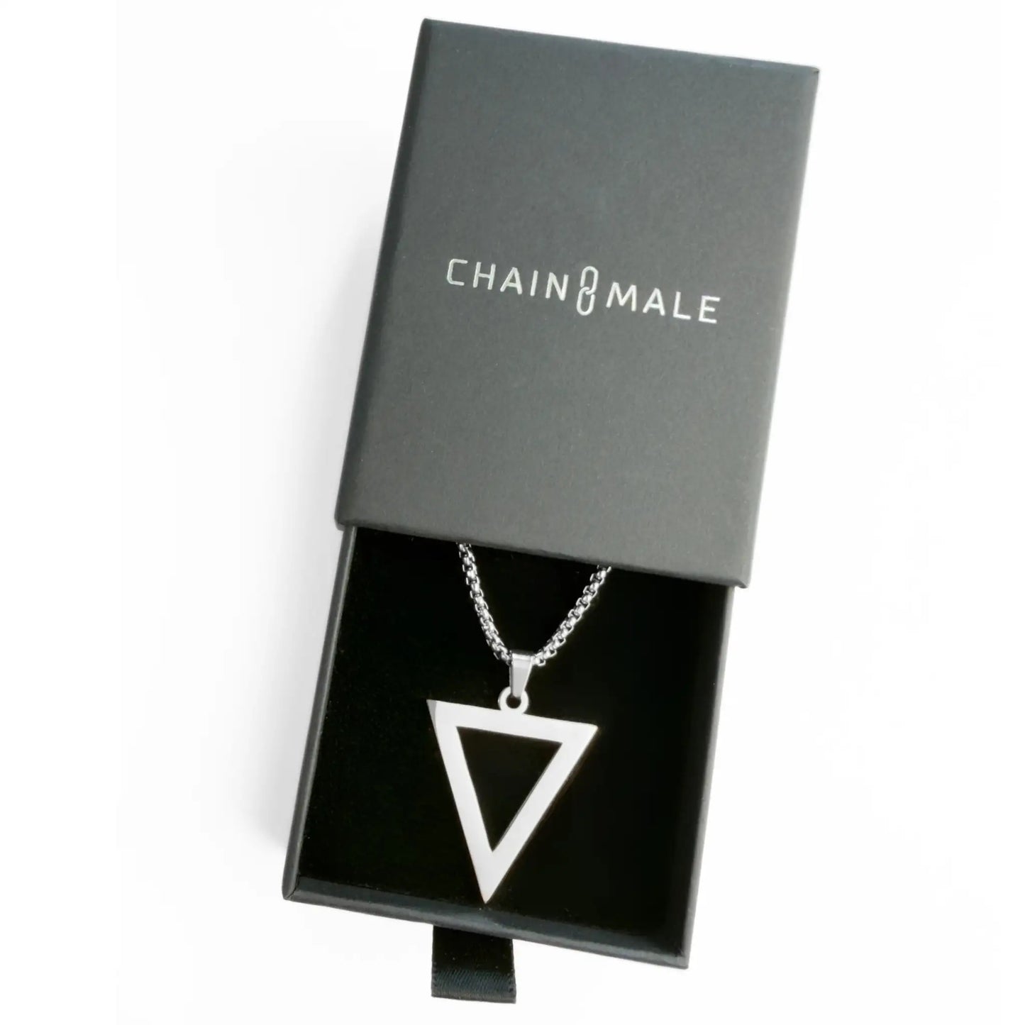 Stainless steel silver triangle pendant in a black Chain Male jewellery box on a white background