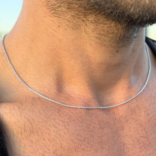 Chain Male silver 1.2mm box chain necklace close-up, ultra slim stainless steel men's everyday jewellery