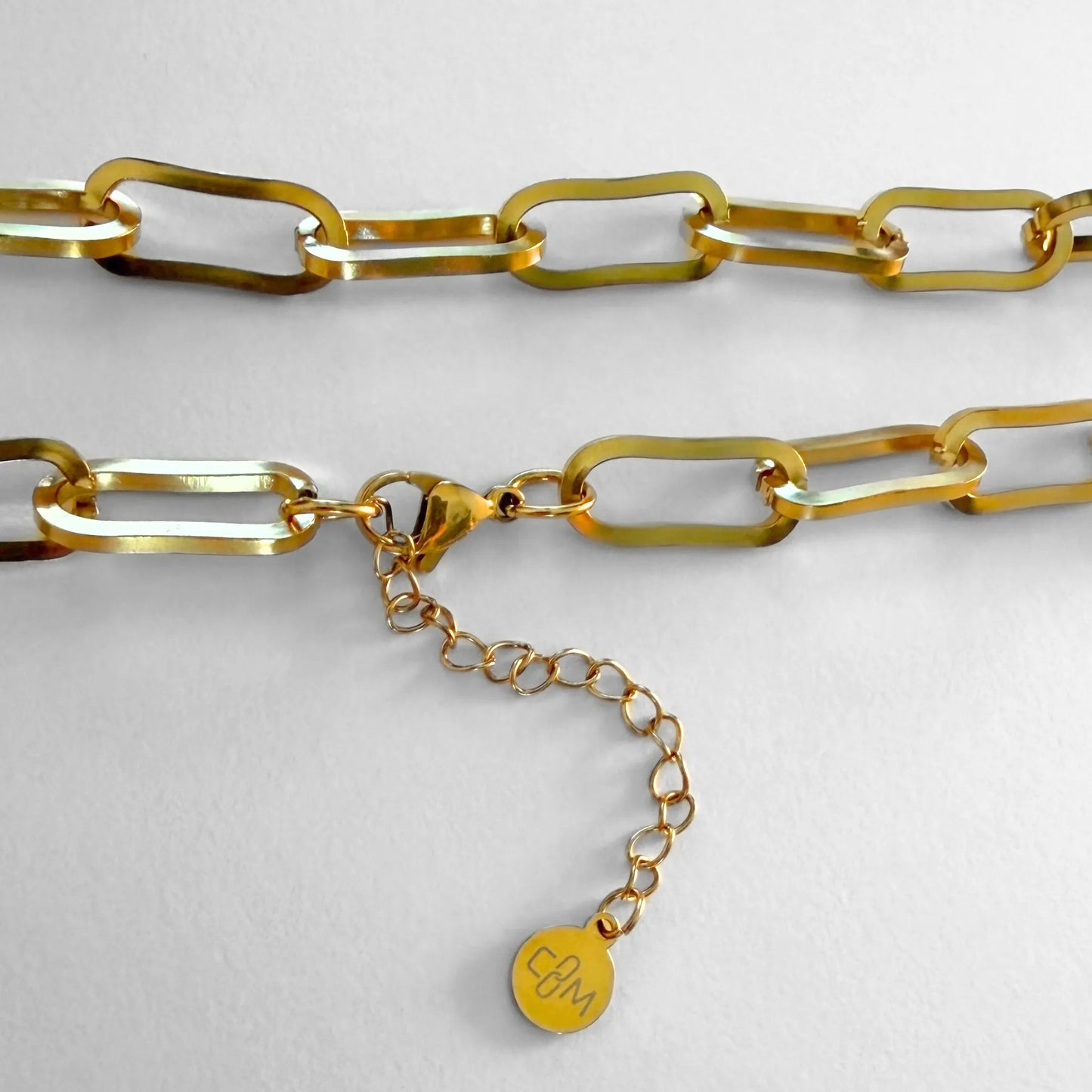 Chain Male gold paperclip choker necklace flat lay with extension chain and CM charm, 18ct gold plated men's Everyday collection