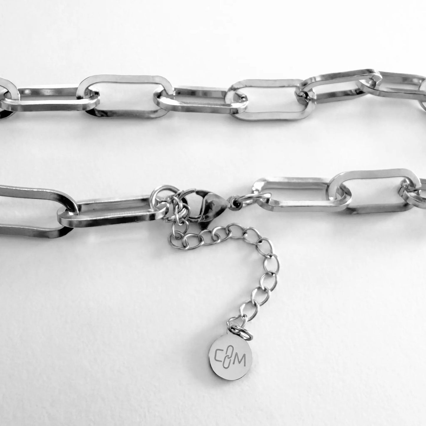 Chain Male silver paperclip choker necklace flat lay with extension chain and CM charm, men's Everyday collection