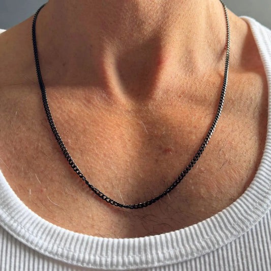 Chain Male black 3mm curb chain necklace close-up, black plated stainless steel everyday men's jewellery