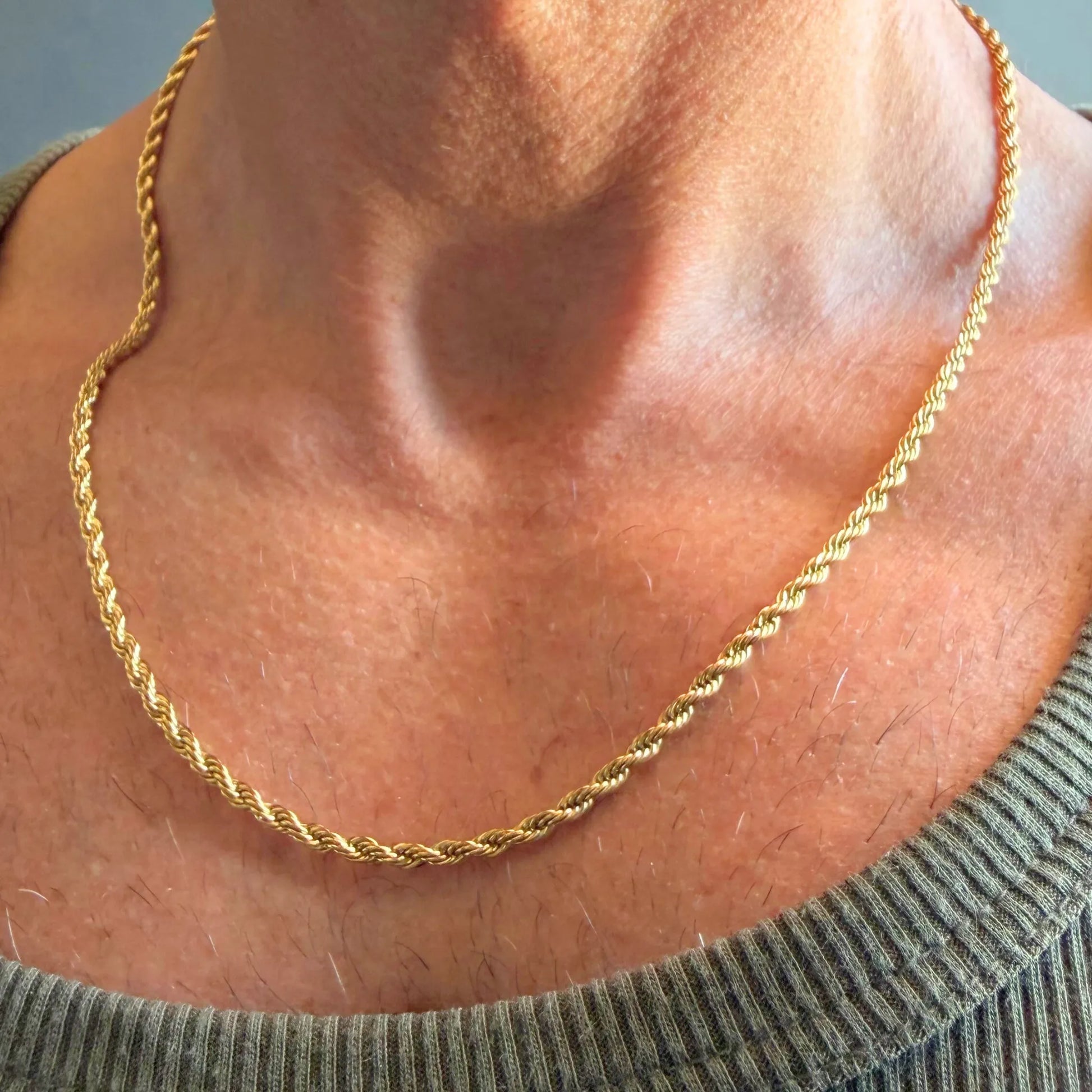 Chain Male gold rope chain necklace close-up worn with singlet, 18ct gold plated twisted men's jewellery