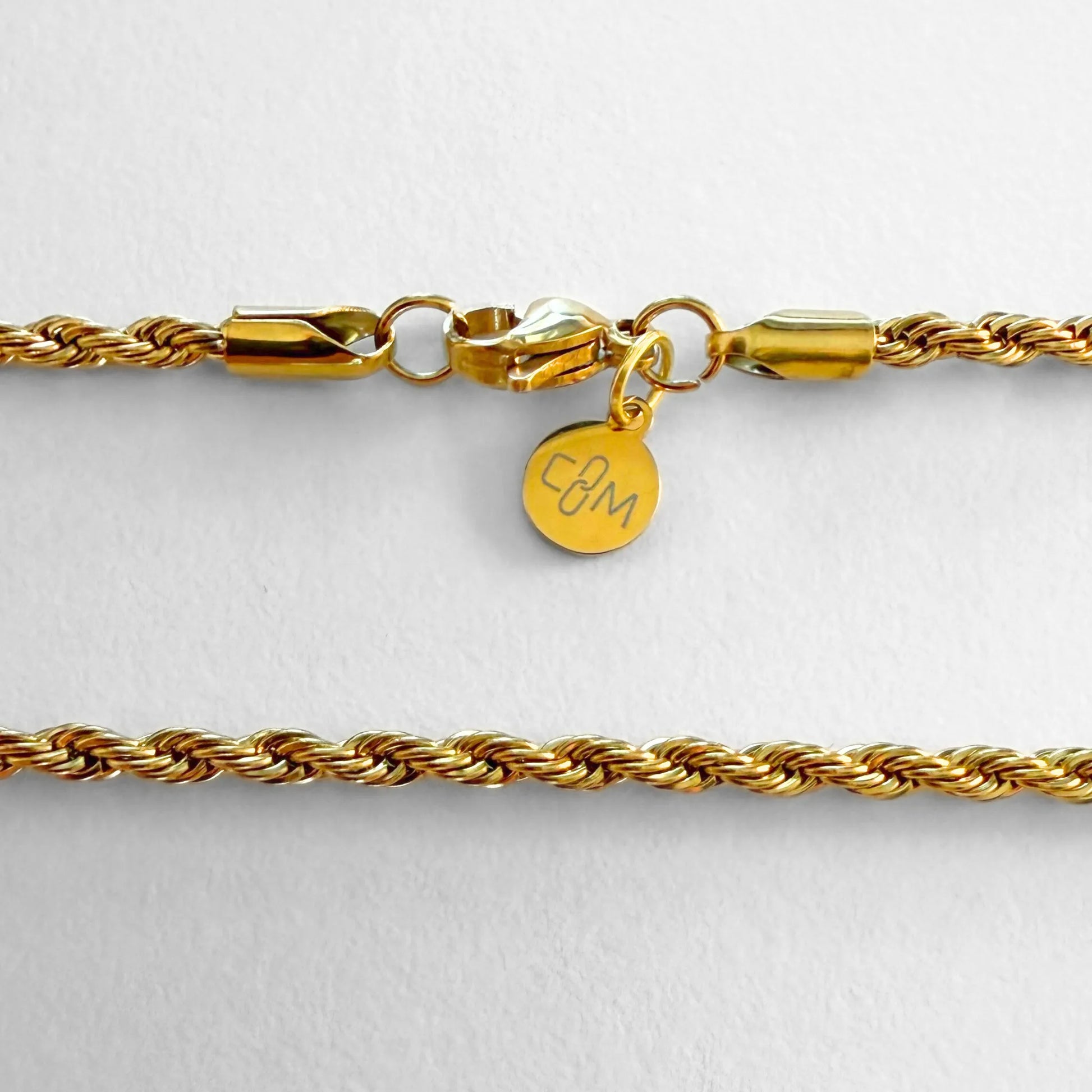 Chain Male gold rope chain necklace flat lay with CM charm, 18ct gold plated men's Everyday collection