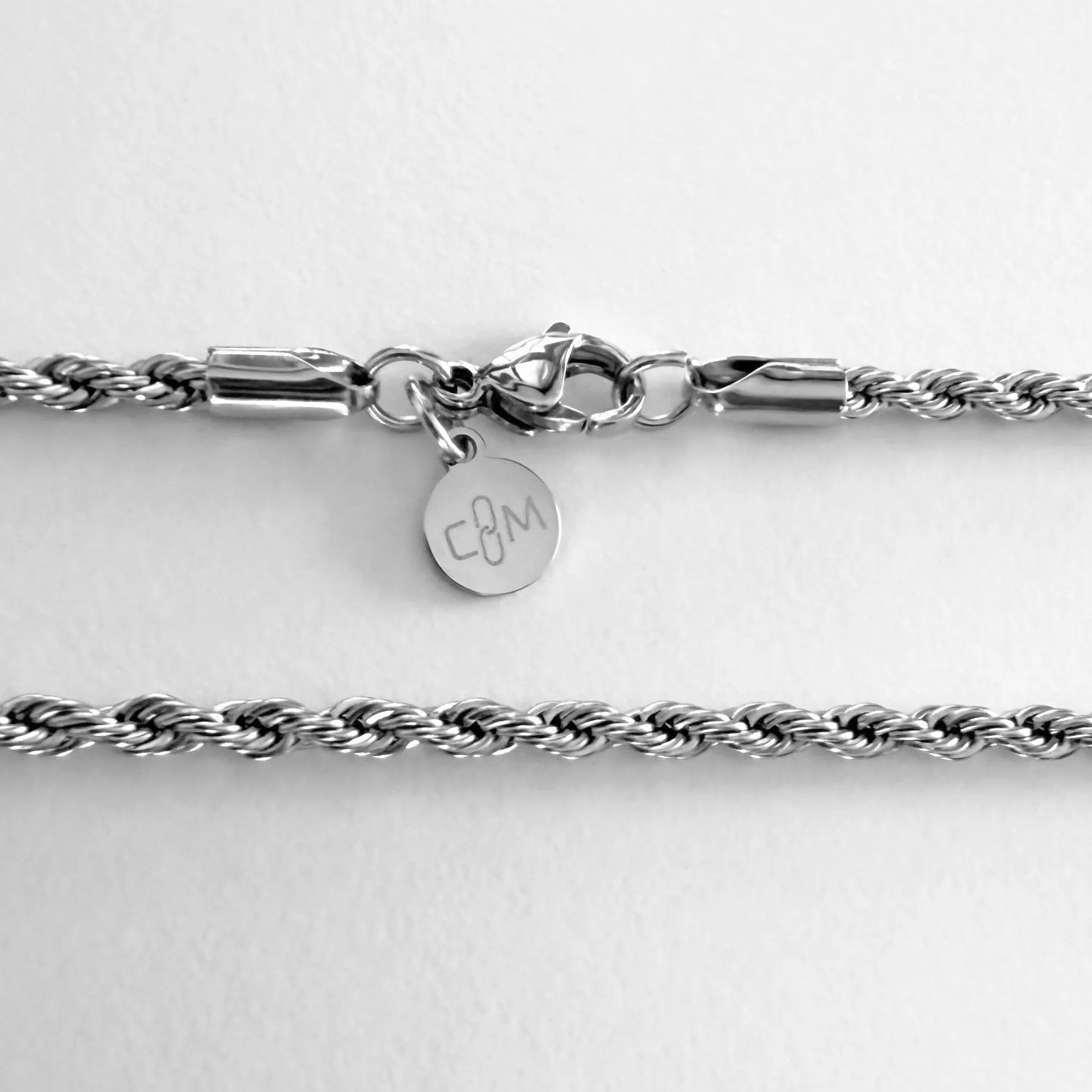 Chain Male silver rope chain necklace flat lay with CM charm, 3mm twisted stainless steel men's Everyday collection
