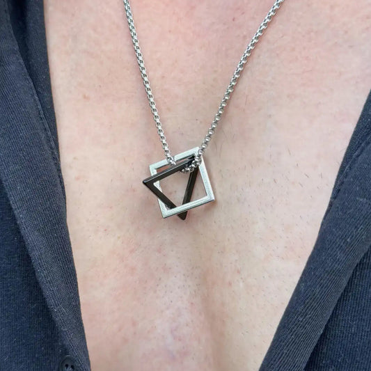 Stainless steel necklace with a geometric pendant worn by a man